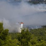 Firefighting helicopters collide midair in Greece as wildfires rage across Europe