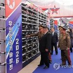 Kim Jong-un really is alive and well as 'tubbier-than-ever' tyrant watches deadly missile display